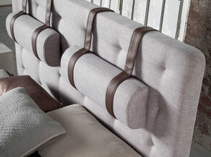 Letto grigio in tessuto trapuntato