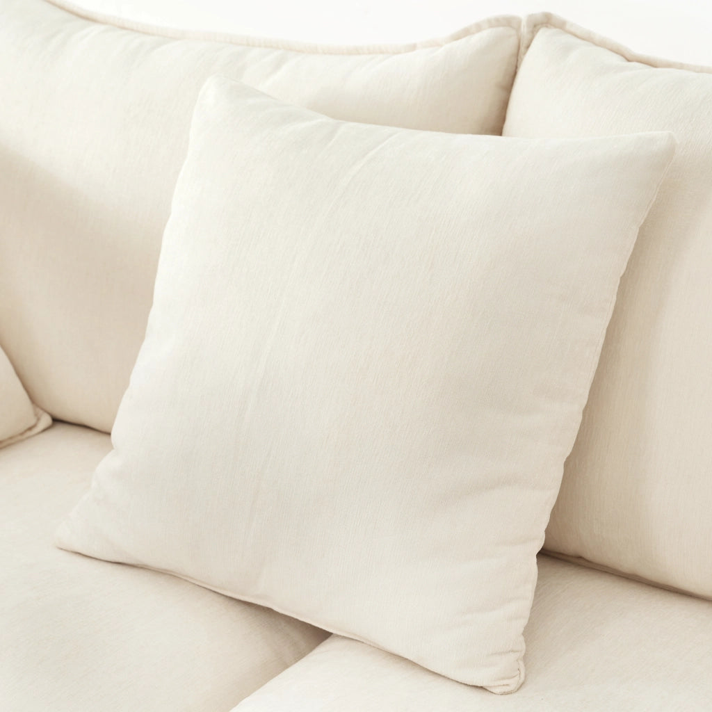 Divano angolare 3 posti - con chaise longue mobile e 4 cuscini - in chenille beige