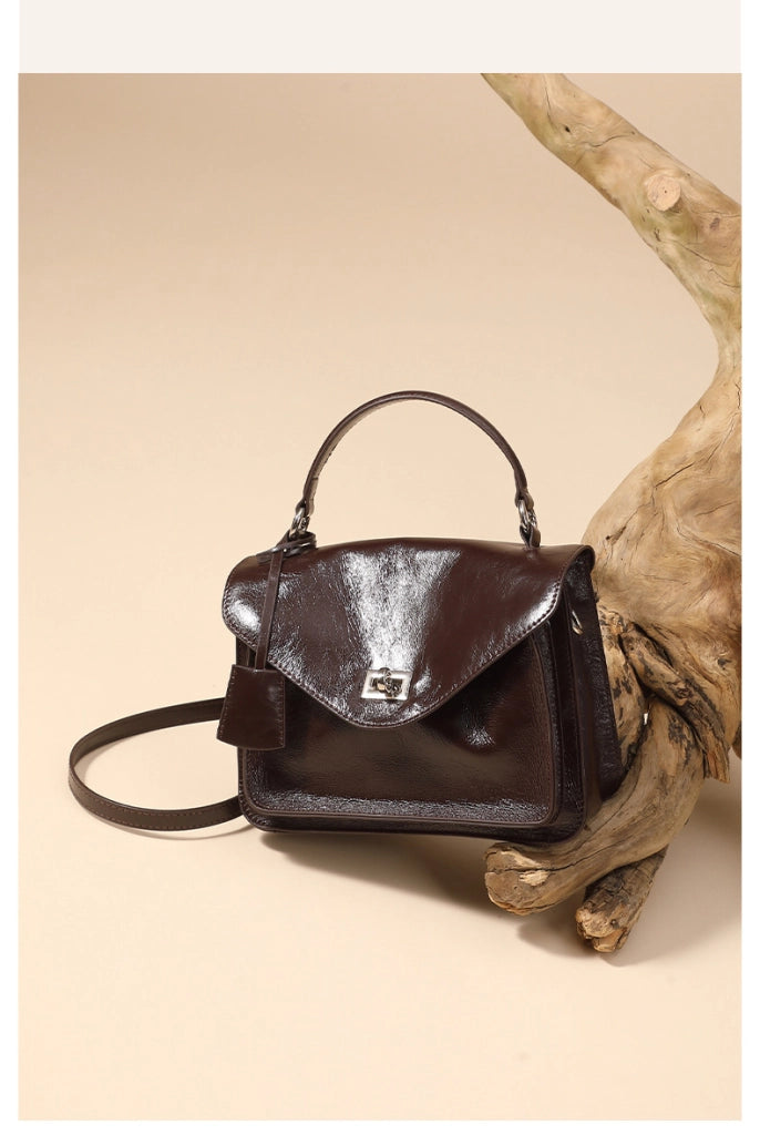 Borsa a tracolla da donna in vera pelle, modello tote/hobo, colore marrone.