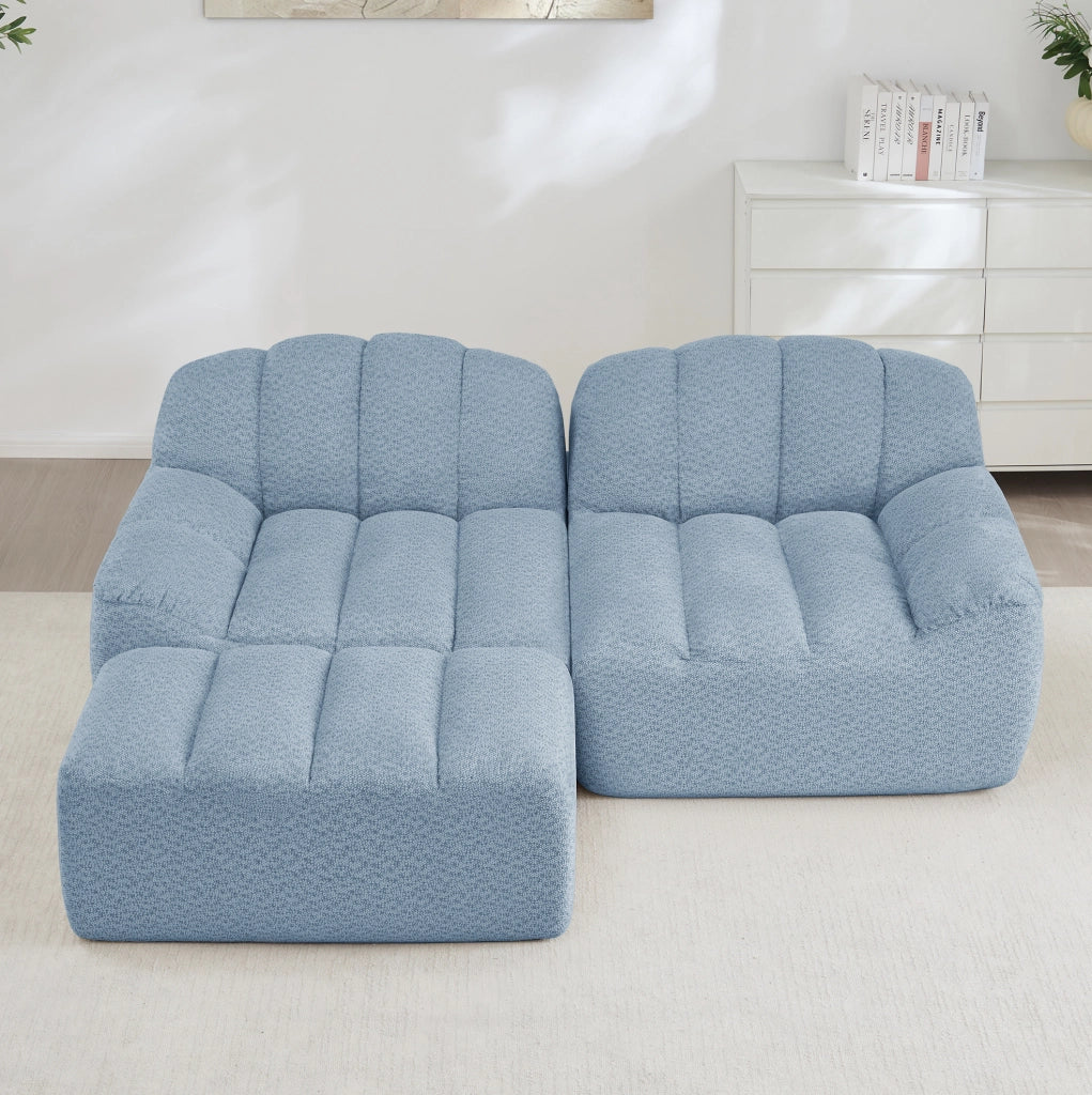 Divano angolare modulare 2 posti con pouf in pile granulato blu HOMVRA