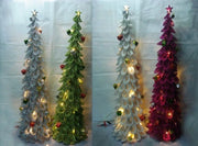 Decorazione Natalizia Casa Albero di natale con pacchetti e luci