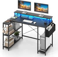 Scrivania Angolare da Gaming, Scrivania Salvaspazio a Forma di L con Luci LED, Stazione di Ricarica, Ripiani e Supporto per Monitor, Scrivania ad Angolo per Casa e Ufficio (Nero)