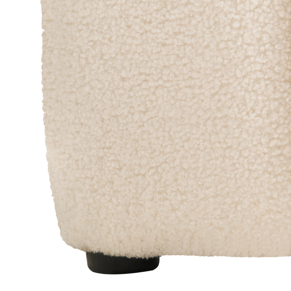 Poltrona imbottita accogliente con seduta spessa e morbida in bouclé beige chiaro stile moderno