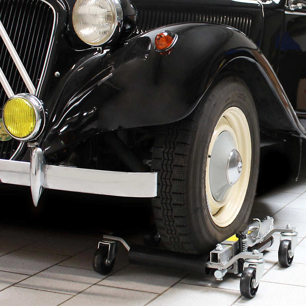 Set con supporto per 4x carrelli sposta auto e 4x carrelli di ausilio alla manovra con cric idraulico per max 680kg l'uno e gomme fino a 30cm