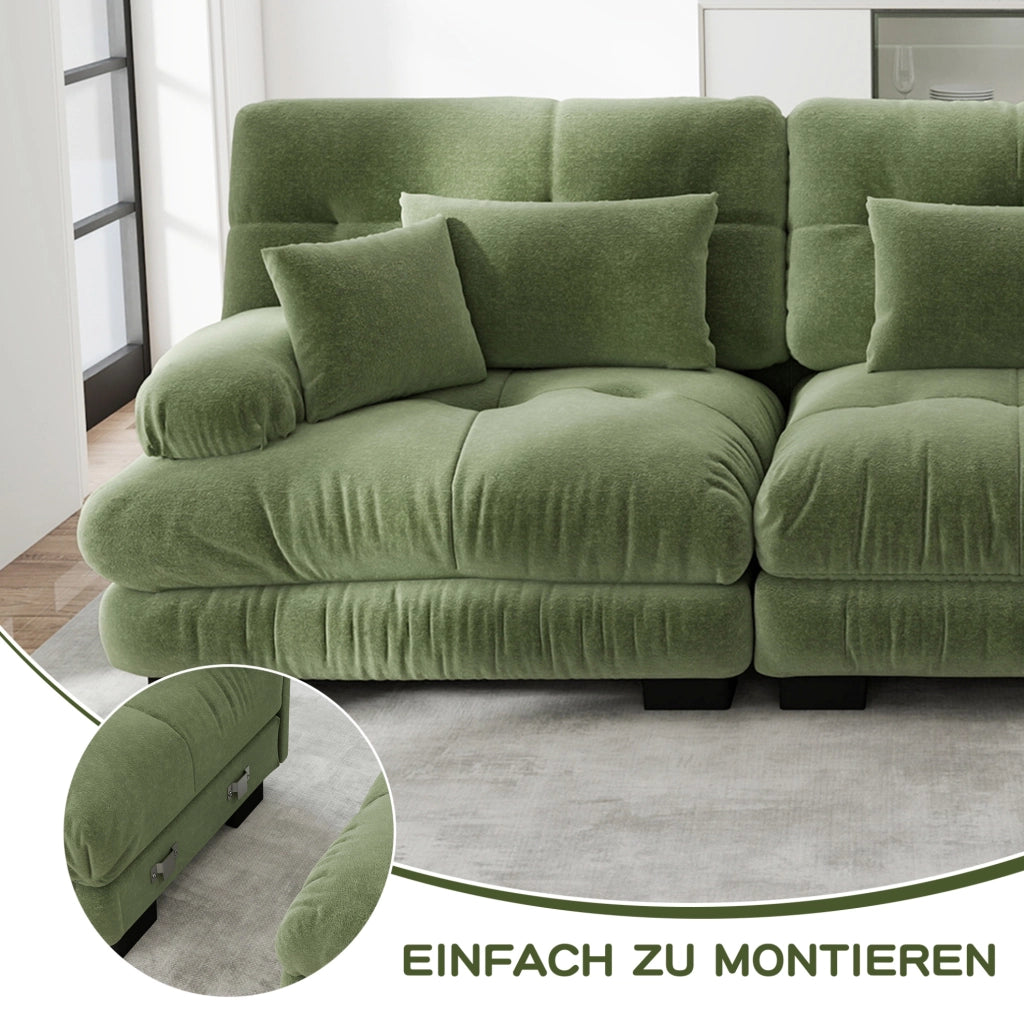 Divano modulare in chenille verde con seduta profonda e braccioli imbottiti arrotondati