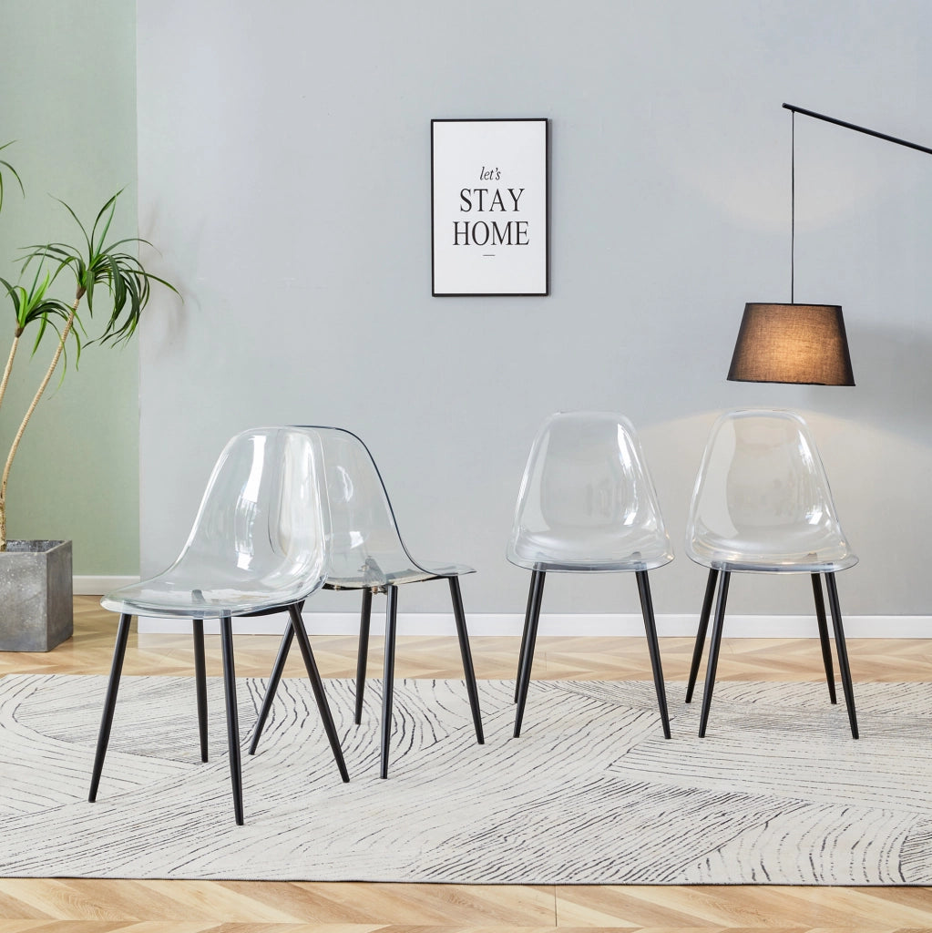 Set 4 sedie da pranzo in plastica trasparente con gambe in metallo nero