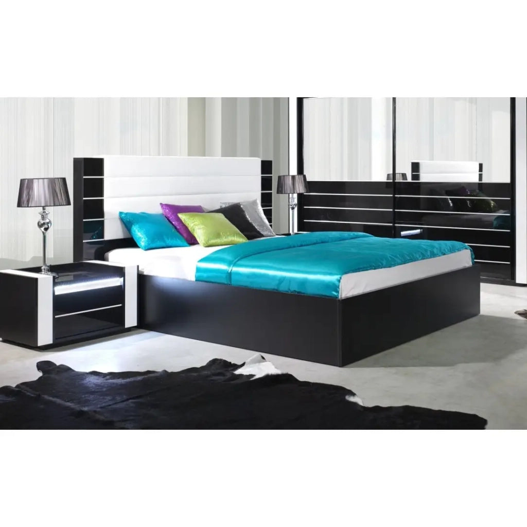 Letto contenitore 160 cm nero e bianco lucido con finitura in similpelle bianca