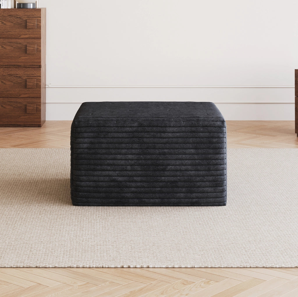 Pouf ottomana in tessuto nero; design modulare senza montaggio