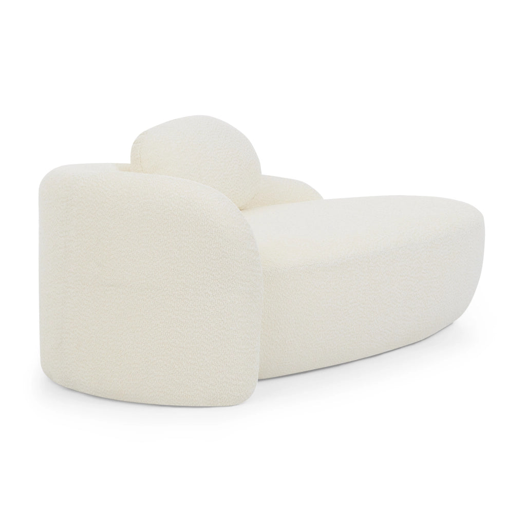 Divano compatto in tessuto Teddy beige con design arrotondato e cuscino integrato