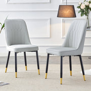 Chaise da pranzo in pelle pu con schienale ergonomico e seduta imbottita, gambe metalliche nere, grigio chiaro