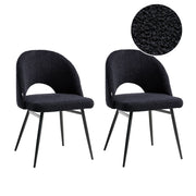 Set di 2 sedie da pranzo in tessuto bouclè nero braccioli schienale intagliato gambe in metallo moderna industriale