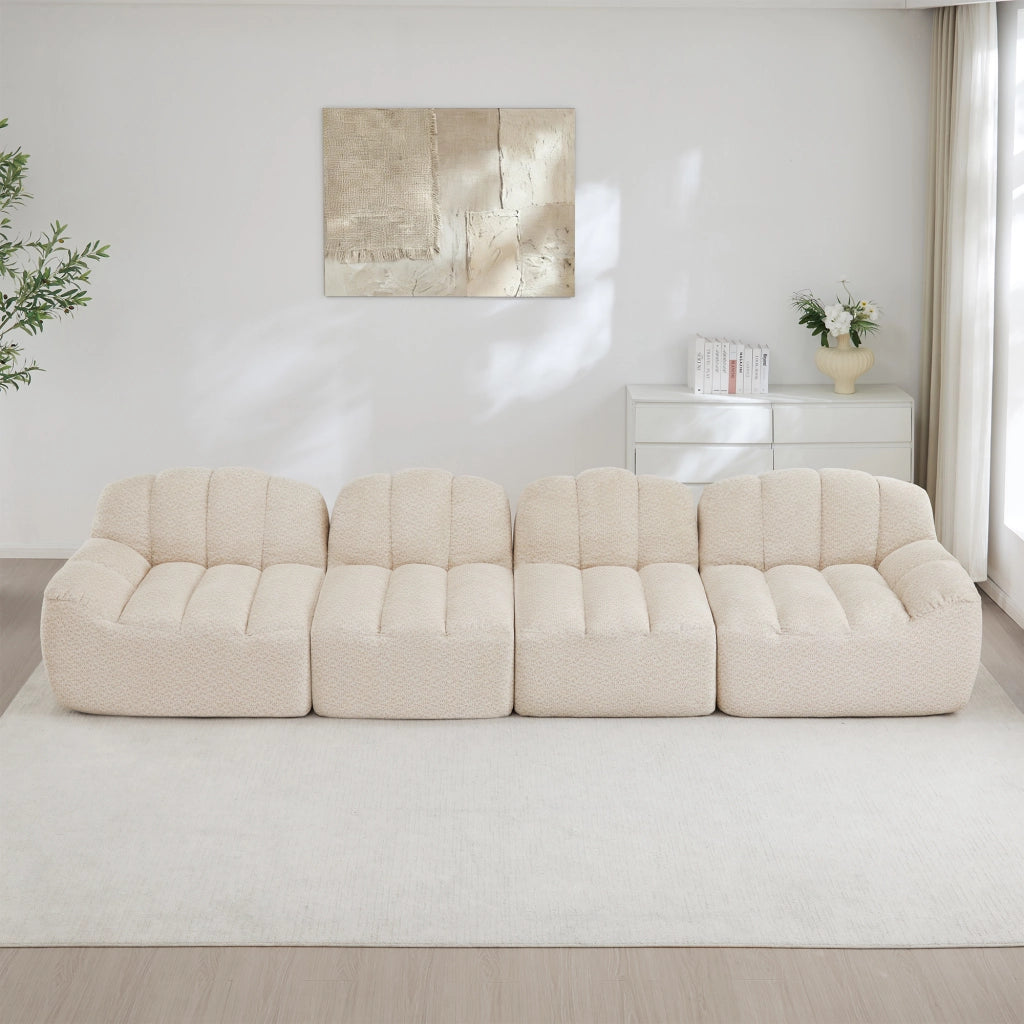 Divano modulare 4 posti senza struttura; seduta profonda; schiuma 32D; pile granulato beige bianco