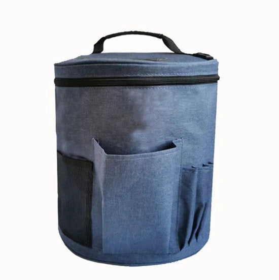 Borsa per la conservazione di materiali da ricamo in tessuto blu scuro.