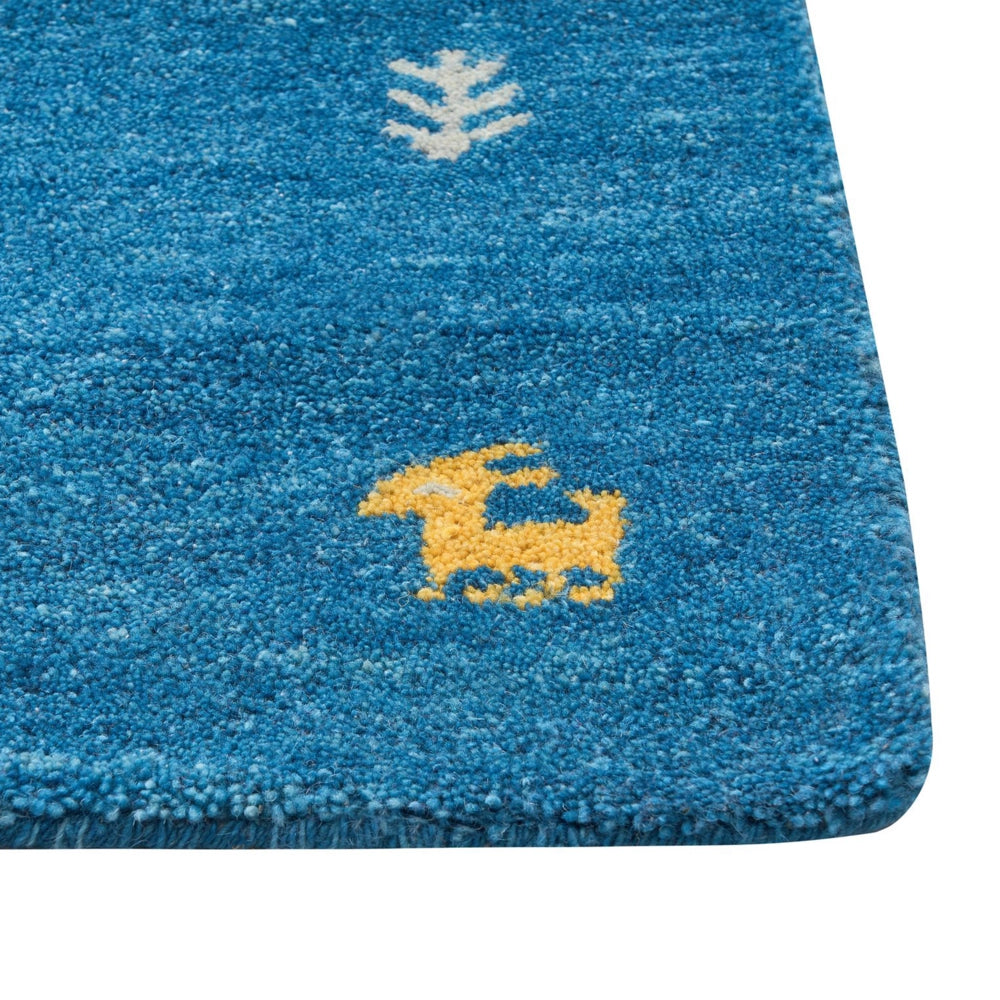 Tappeto Gabbeh in lana blu 80 x 150 cm, trapuntato a mano con motivi animali occidentali e design rustico