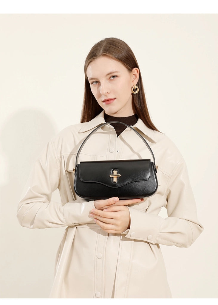 Borse a tracolla e borsette da donna in vera pelle, nere, con manico superiore.