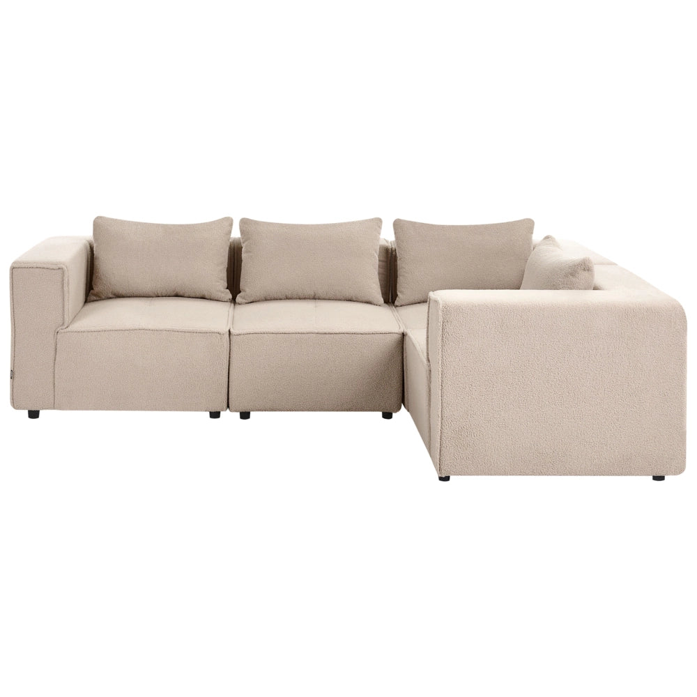 Divano a 4 posti in tessuto bouclè modulare beige lato sinistro stile minimale moderno