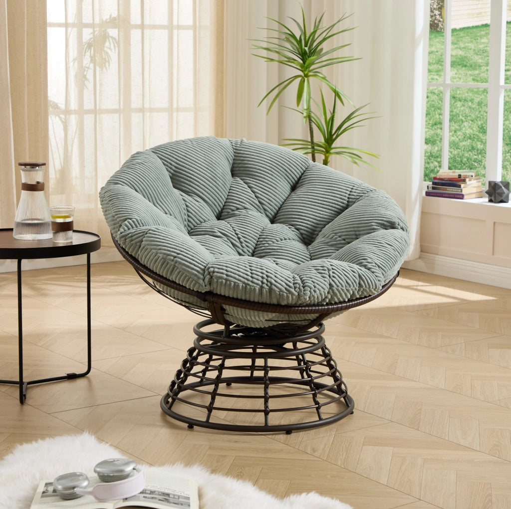 Poltrona Papasan girevole 360° con cuscino in velluto a coste; acciaio e rattan PE; verde chiaro