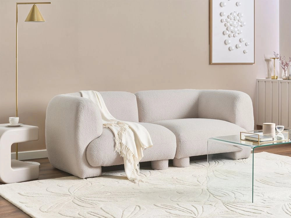 Divano modulare bouclé a due posti profilo ribassato forma organica bianco sporco