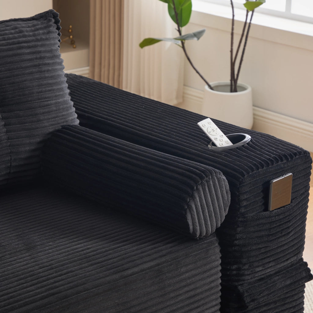 Divano letto 3 posti in tessuto cord con cuscini memory; tasche laterali e portabicchieri; nero