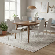 Set di 4 sedie da pranzo impilabili in similpelle bianca Arianna con struttura in metallo facili da pulire | Duzzle