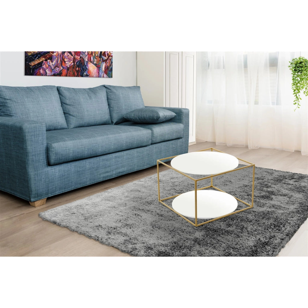 Tavolino da salotto Cody con ripiani in vetro bianco e oro