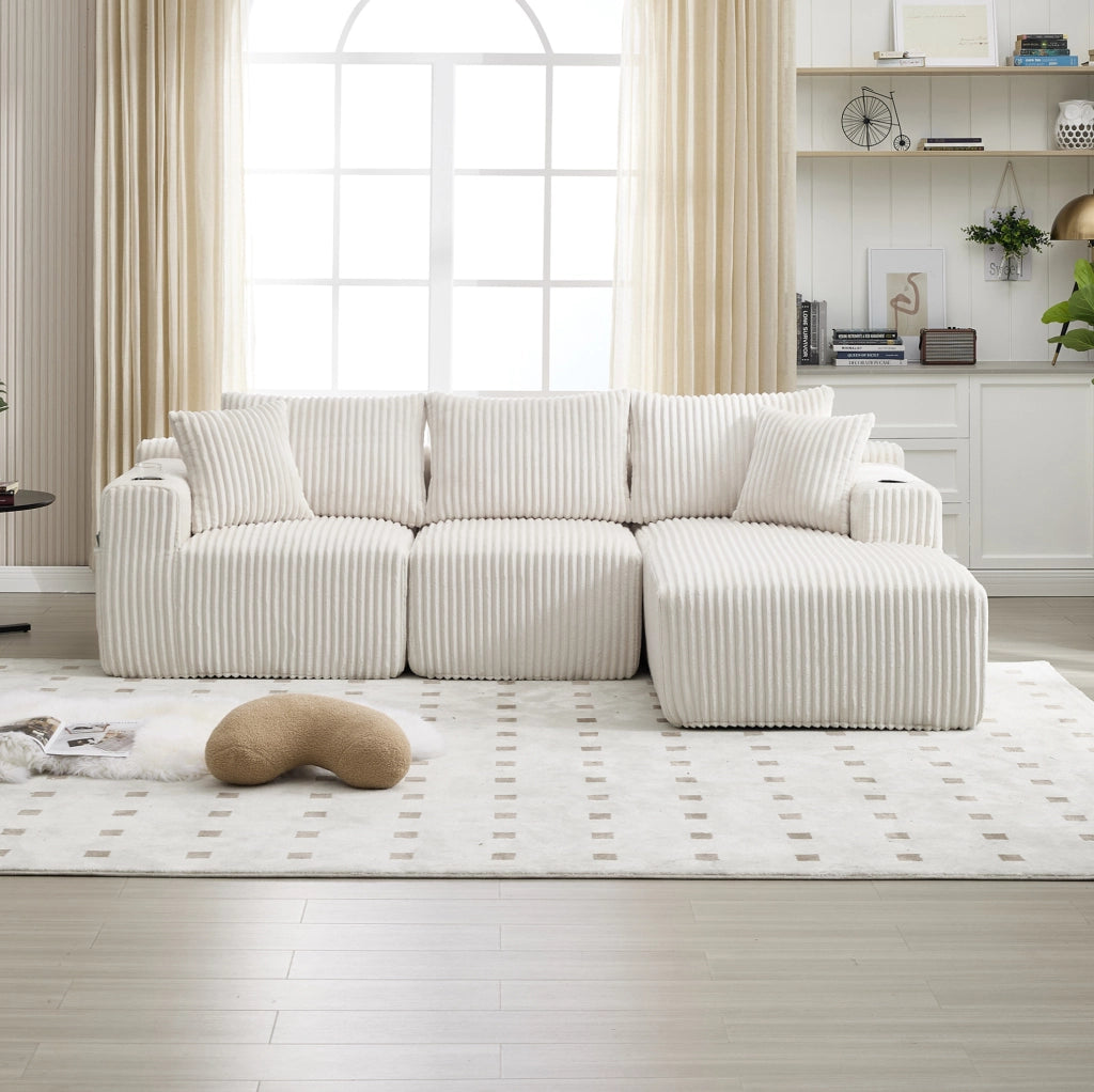 Divano modulare in velluto a coste beige con chaise longue