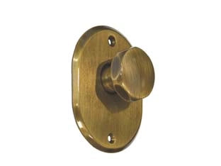 MOSTRINA OVALE CON POMOLO IN OTTONE BRUNITO 331/35  mm.70x90h. sp. mm.4  pomolo mm.35    CIPIERRE