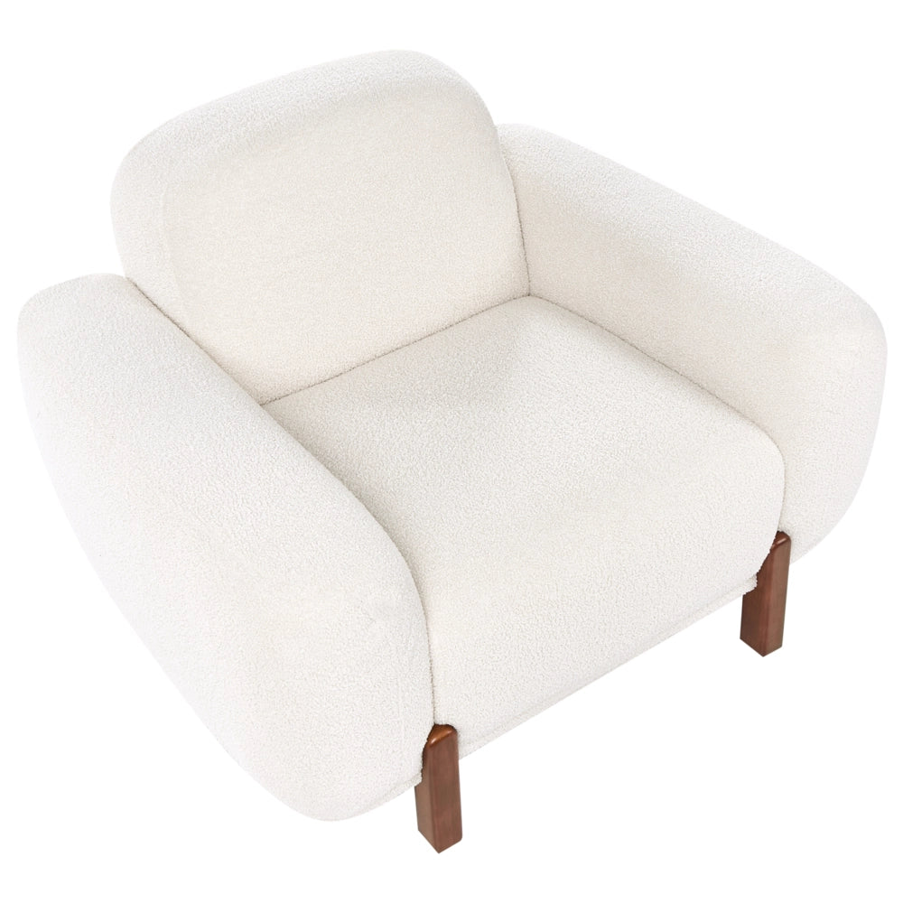 Poltrona bianca bouclé imbottita morbida moderna organica bassa curvilinea stile moderno
