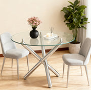 Tavolo da pranzo con piano in vetro temperato trasparente e gambe in metallo silver