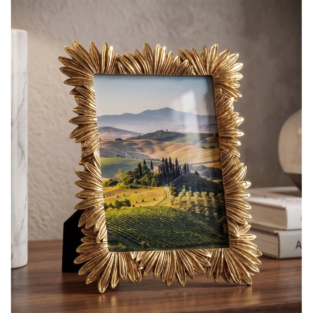 Cornice portafoto elegante con decoro a foglie in poliresina oro