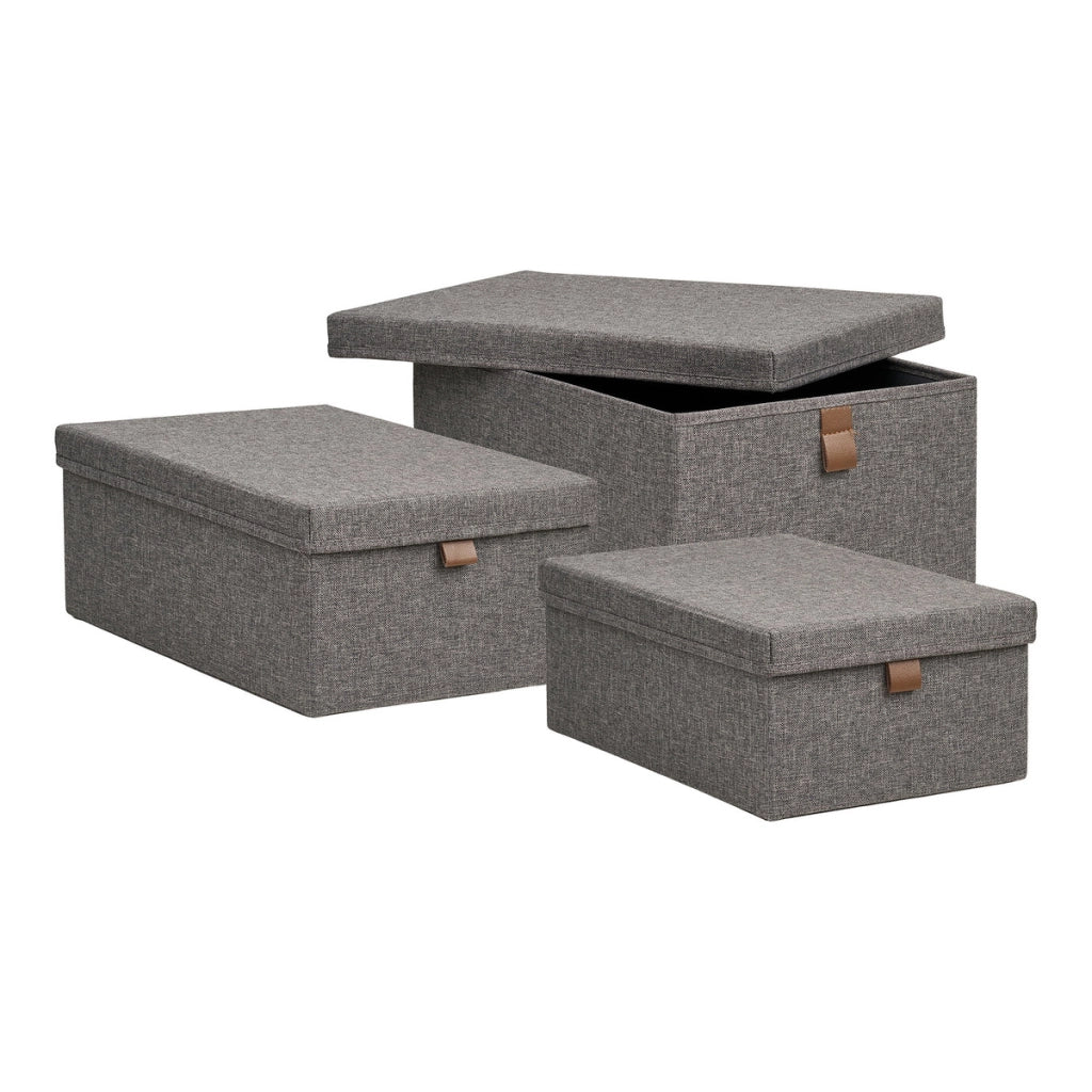 Set 3 scatole Noto in tessuto grigio scuro con coperchio e linguetta in ecopelle