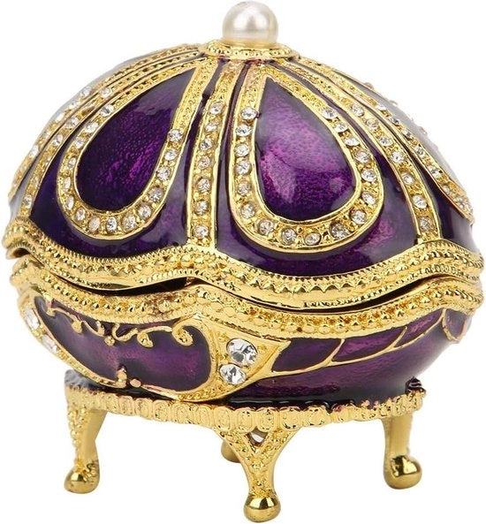 Cassa da gioielli a forma di uovo Fabergé in ebanite con decorazioni a strass.