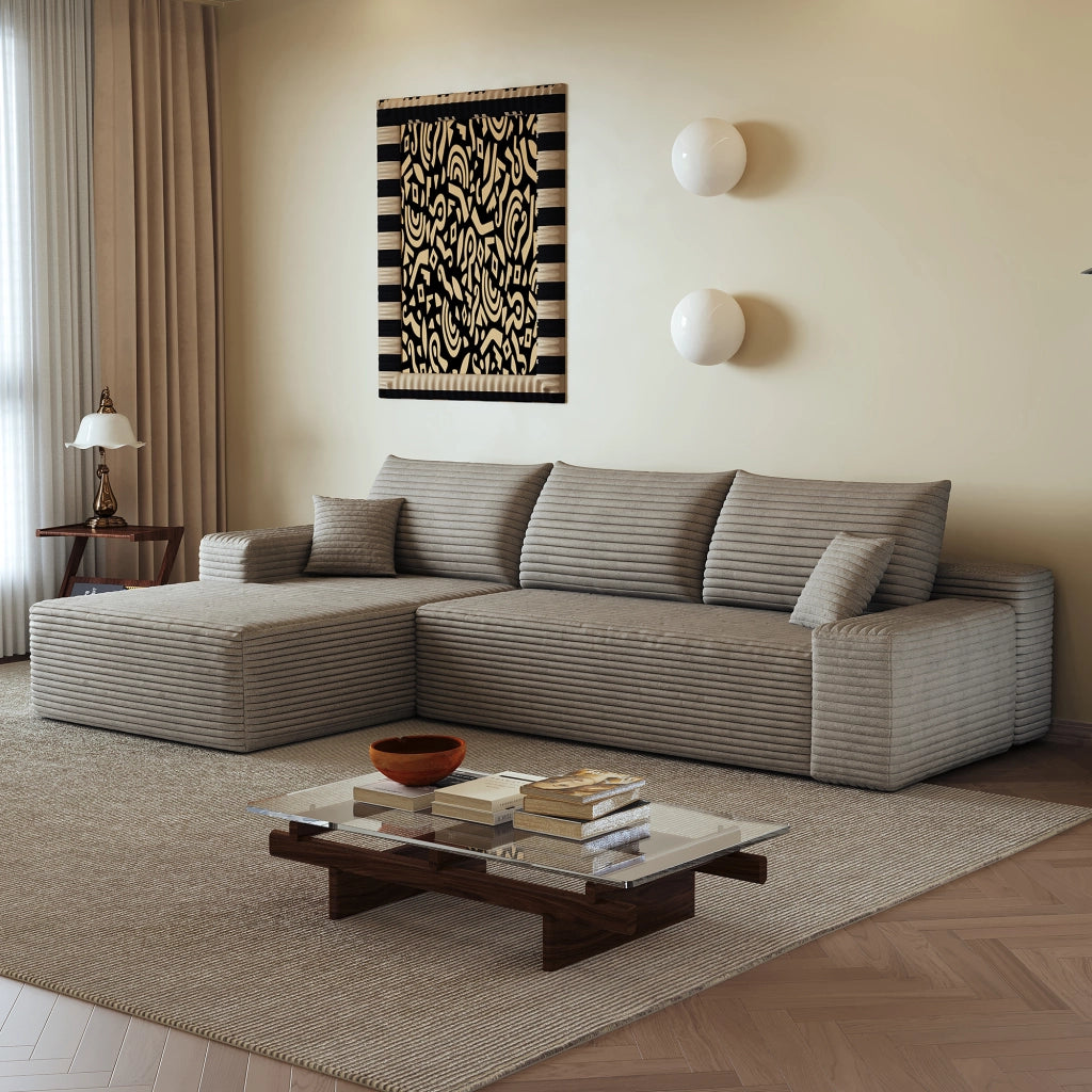 Divano angolare modulare con chaise longue e seduta profonda senza montaggio, in tessuto e schiuma, cammello