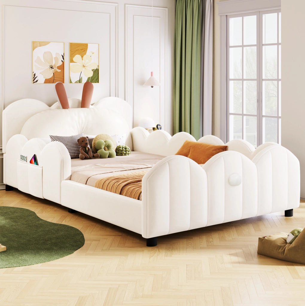 Letto a piattaforma imbottito 90x200 cm beige con testiera a forma di coniglietto e sponde protettive