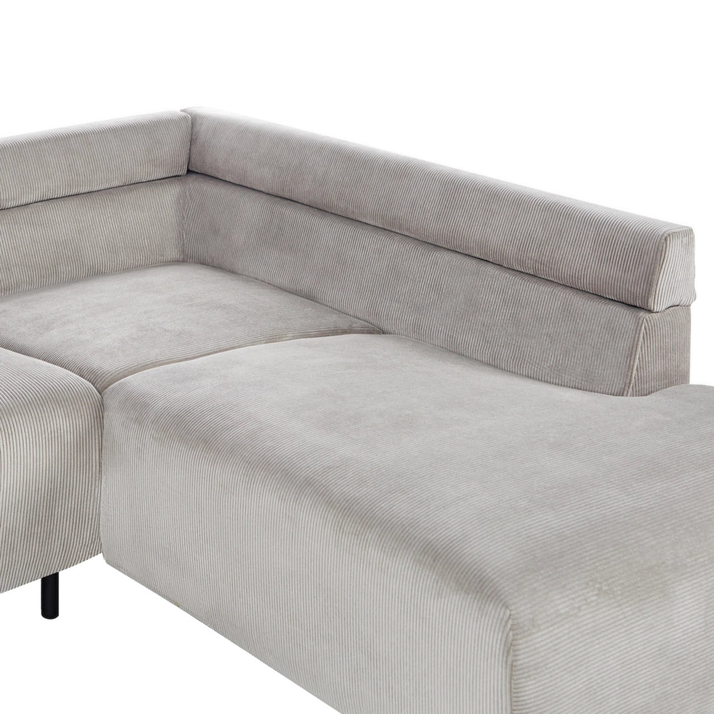 Divano ad angolo in velluto a coste grigio chiaro e gambe in metallo design retrò stile moderno