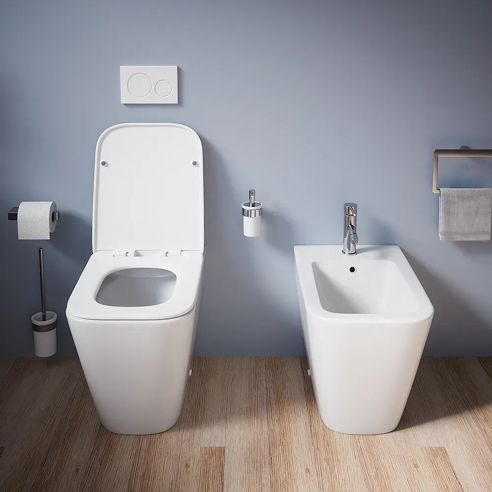 Coppia sanitari in ceramica filomuro vaso rimless, bidet e copri-wc bianco opaco | Kyoto