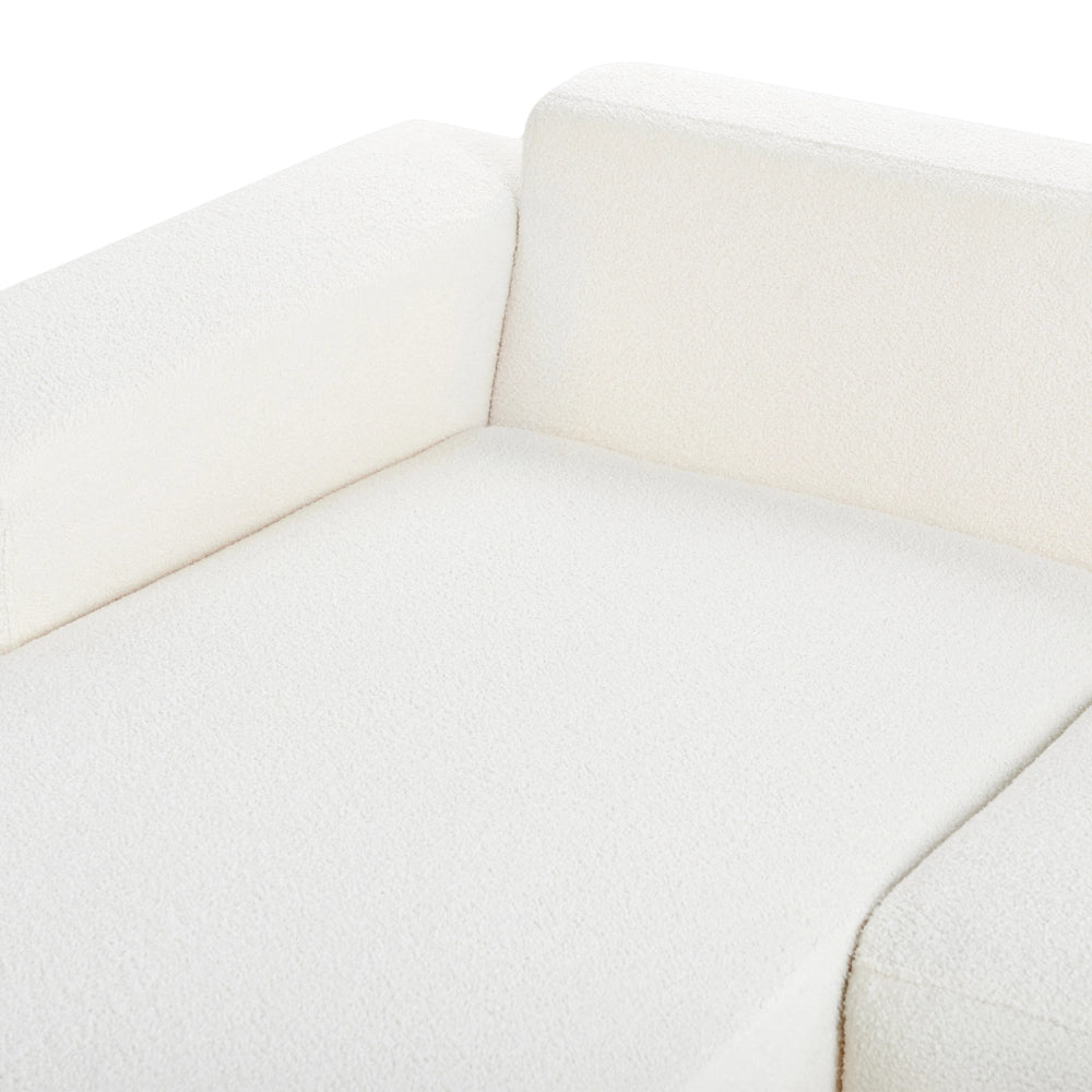 Divano angolare 4 posti in tessuto bouclè bianco lato destro forma a L stile elegante