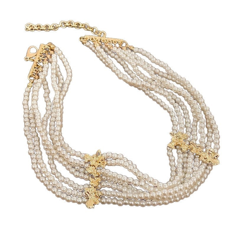 Collana a strati con petali di perline in metallo in stile vintage, dal sapore retr¨°, e collana di perle a pi¨´ strati.