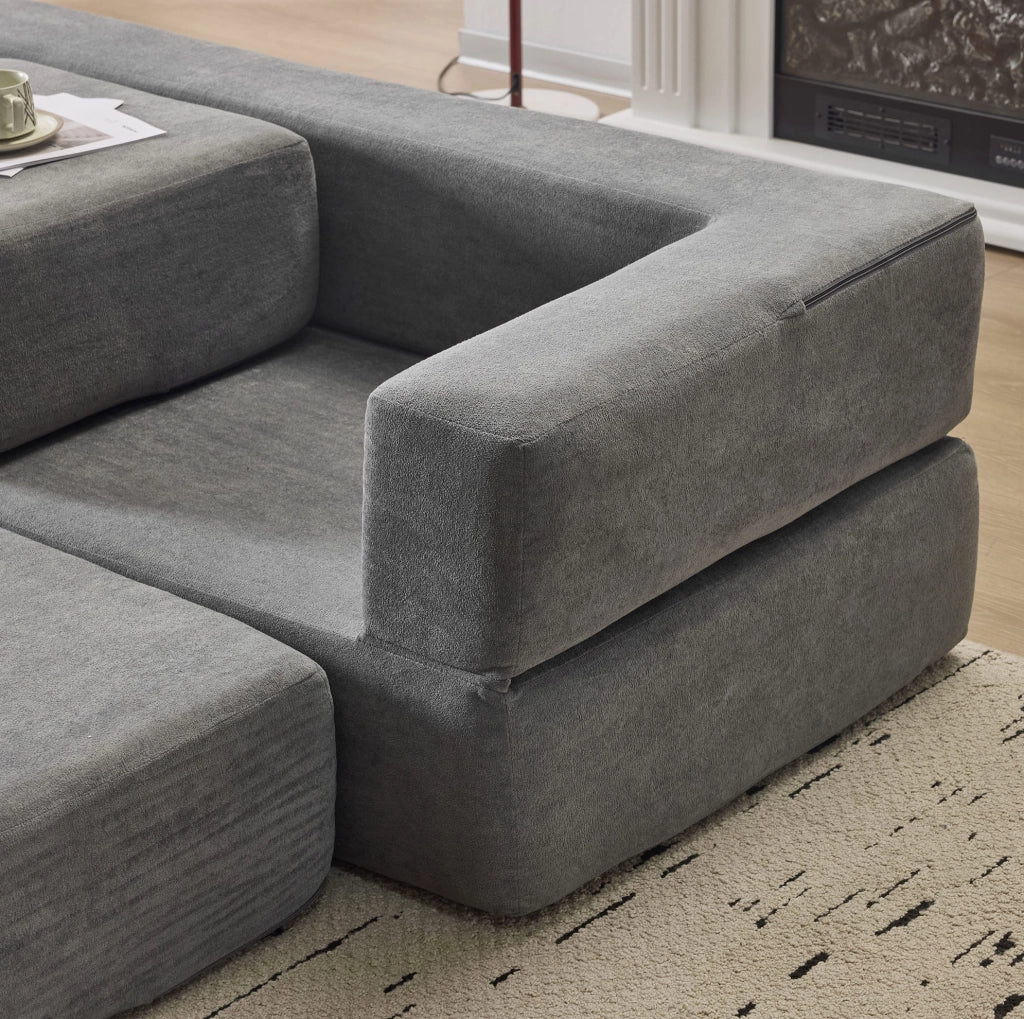 Divano da pavimento modulare trasformabile in letto e tappetino da gioco in chenille grigio scuro