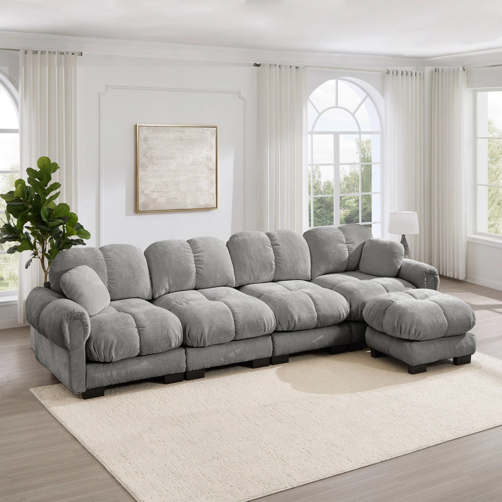 Divano angolare modulare a l con pouf mobile e cuciture trapuntate in tessuto chenille grigio chiaro 330 × 149 × 90 cm