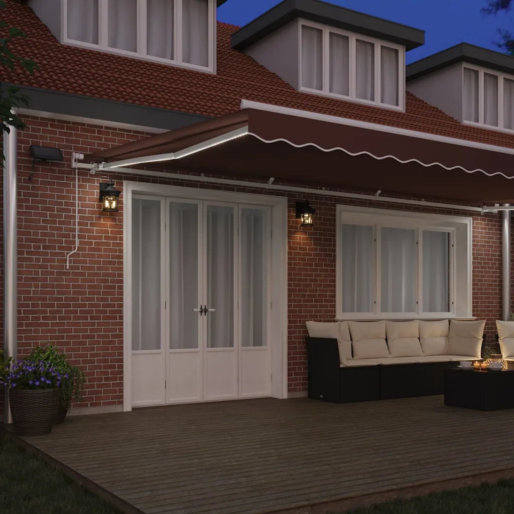 vidaXL Tenda da Sole Retrattile Manuale con LED Marrone 600x300 cm