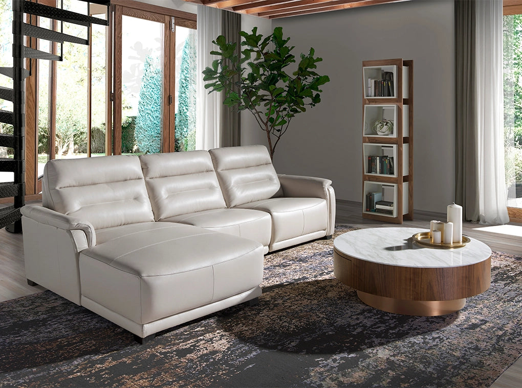 Divano chaiselongue in pelle e con relax