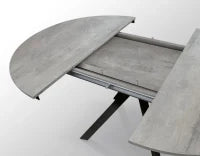 PAZZO DESIGN Tavolo Allungabile con Gambe Incrociate rotondo, Made in Italy, Basamento Nero, Grigio cemento