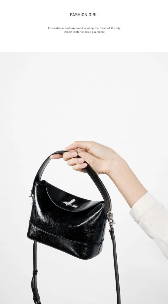 Borsa a mano e borsetta da donna in vera pelle, nera.