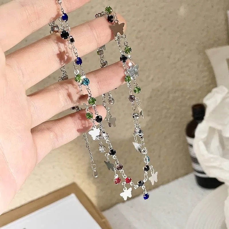 Collana a farfalla e stella realizzata a mano con perline: ciondolo con zirconi colorati