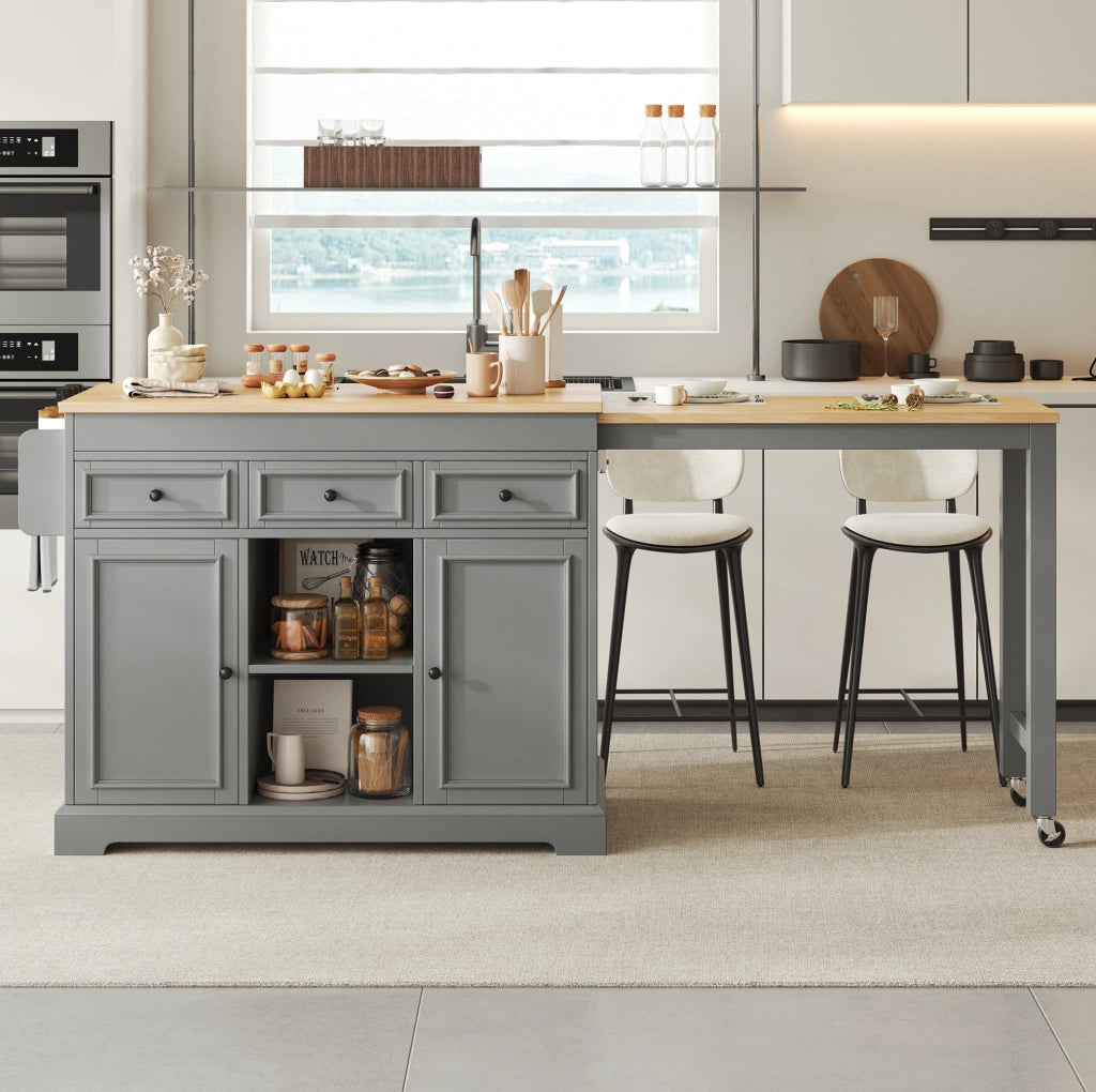 Isola da cucina con ruote grigia con piano estensibile e vani contenitori