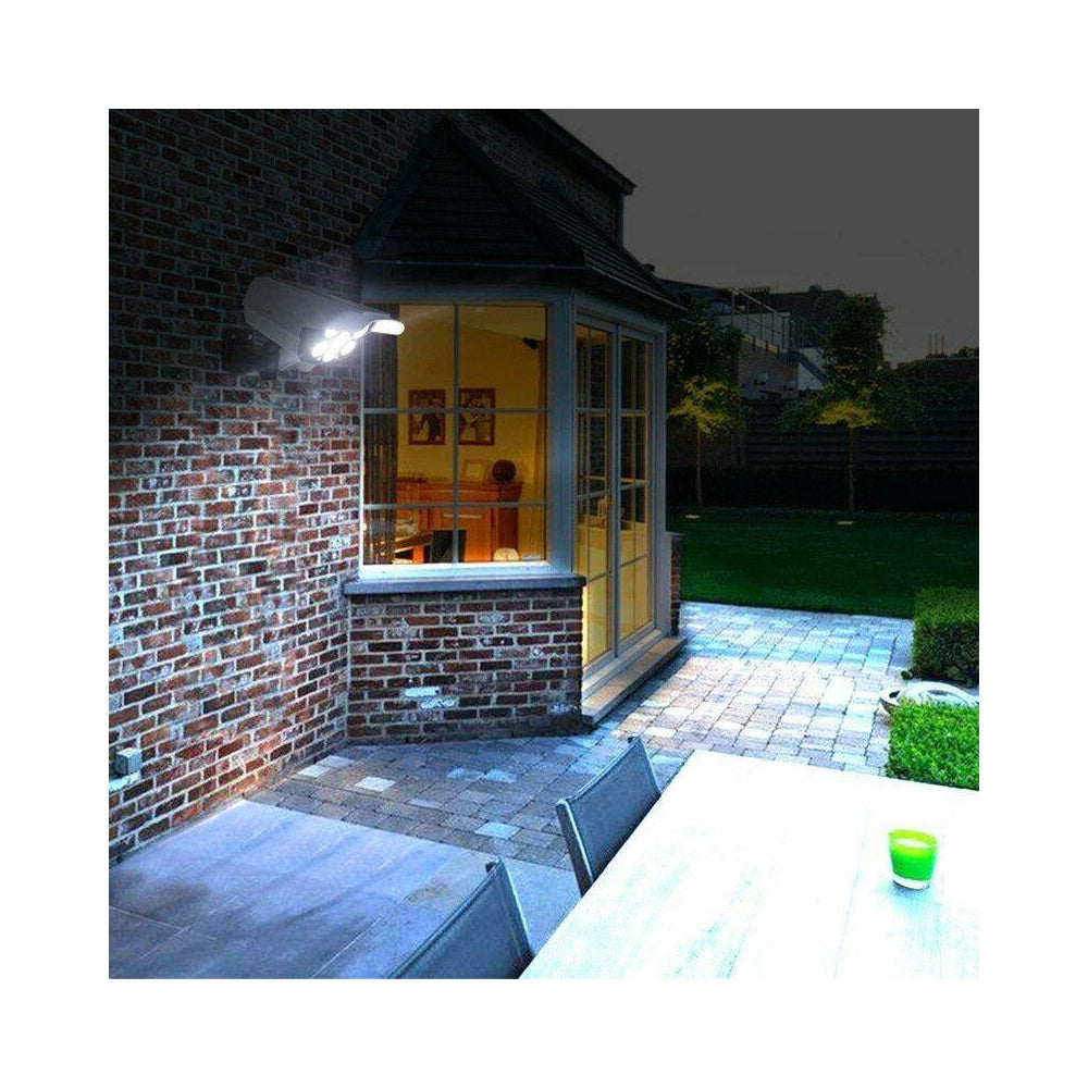 Trade Shop - Telecamera Finta Pannello Solare Con Sensore Di Movimento 77 Led Faretto Luce -