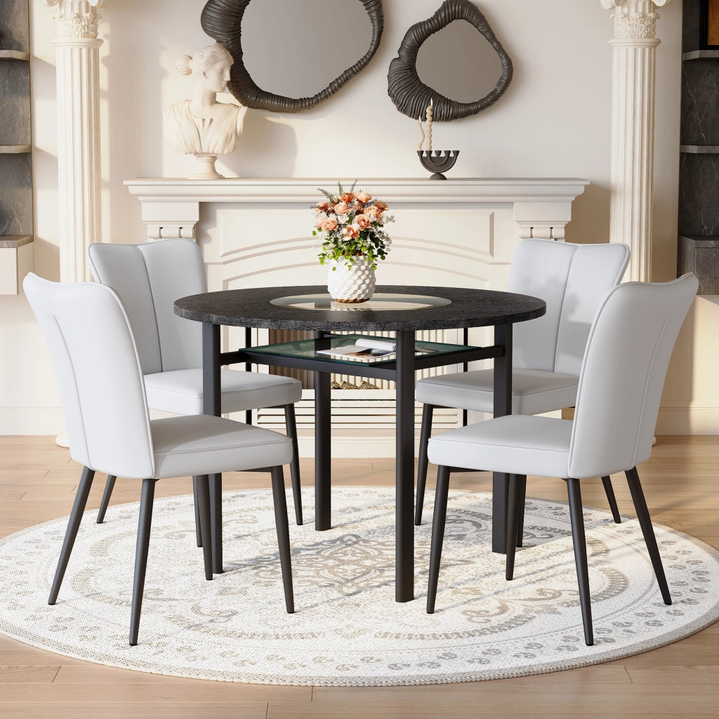Tavolo da pranzo rotondo per 4 persone con piano in MDF effetto legno nero, inserto in vetro e 4 sedie grigie