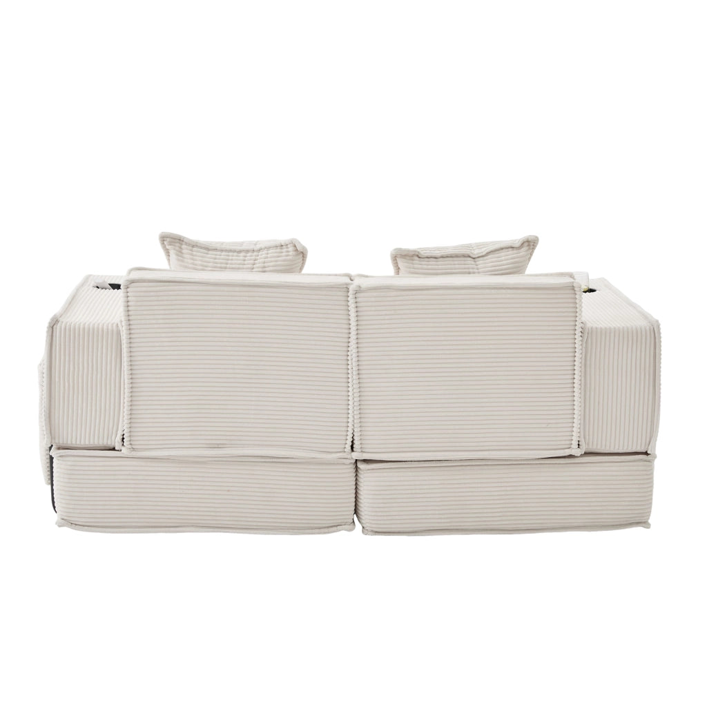 Divano modulare in corduroy beige con cuscini e tasche laterali per angoli lettura e relax