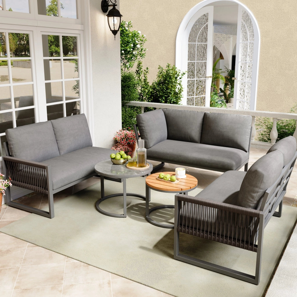 Set lounge da giardino con 3 divani e 2 tavolini; struttura in metallo e poliestere grigio